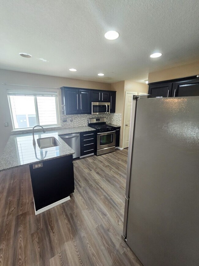 Building Photo - 703 Sitka Deer Ct NW
