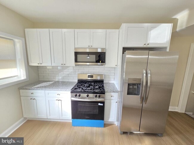 Building Photo - 3838 Greenspring Ave