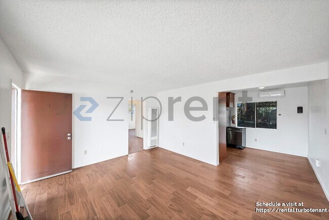 Building Photo - 2458 Normandie Ave