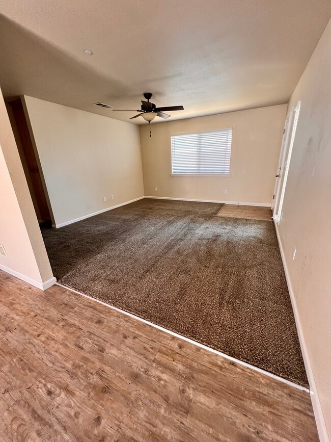 Living room w/ceiling fan - 546 N Gertrude Ave