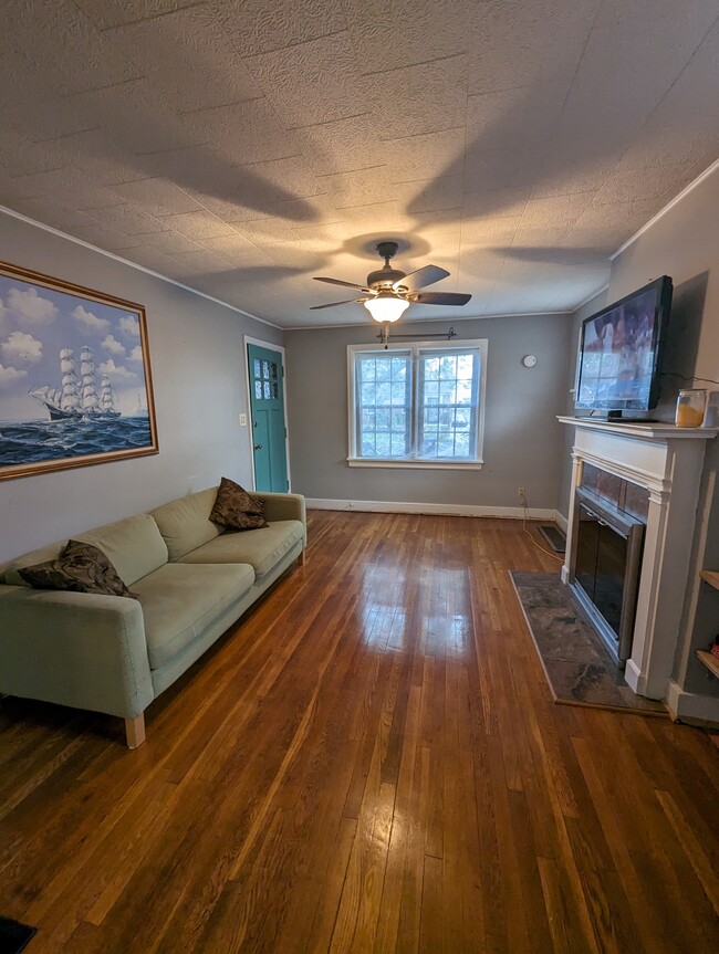 living room with fireplace - 605 Ervay Ave