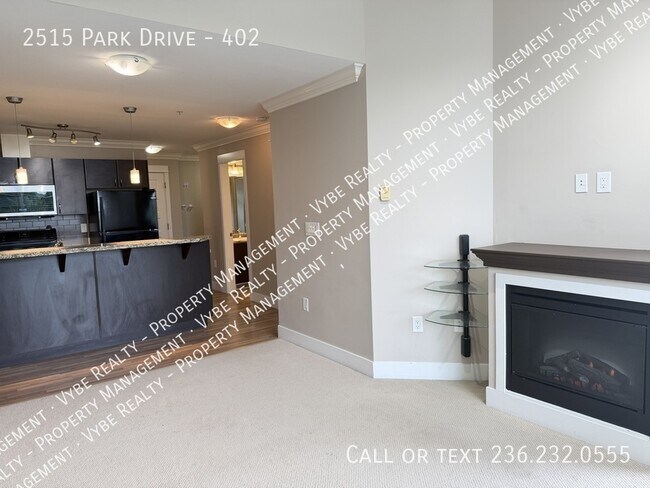 Building Photo - Top Floor Condo - 2 Parking Spots