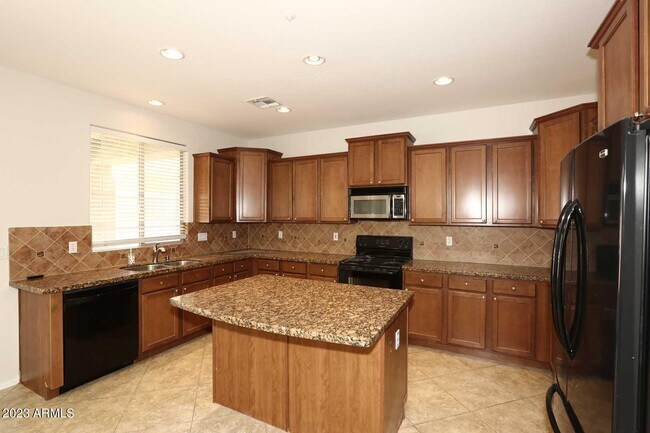 Building Photo - 7062 W Andrew Ln