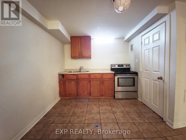 Building Photo - 5815 Riverdale Crescent