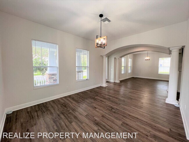 Building Photo - 6 br, 5 bath House - 7121 Blue Indigo Cres