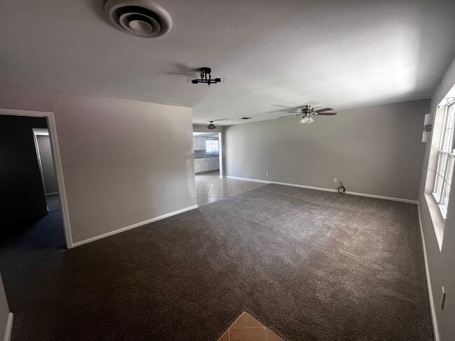 Building Photo - Freshly updated home with privacy fence in...