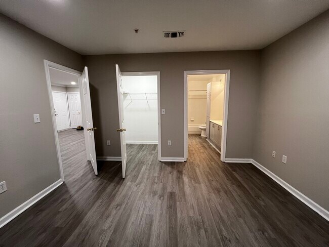 Bedroom w/ Walk-in Closet - 12794 Fair Briar Ln Apartment