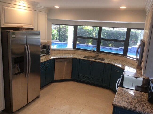 Building Photo - 12305 Sawgrass Ct