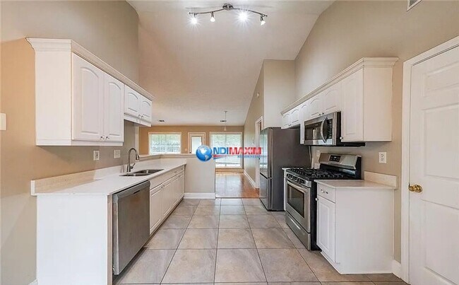 Foto del edificio - Nice ranch in the COLLINS HILL cluster in ...