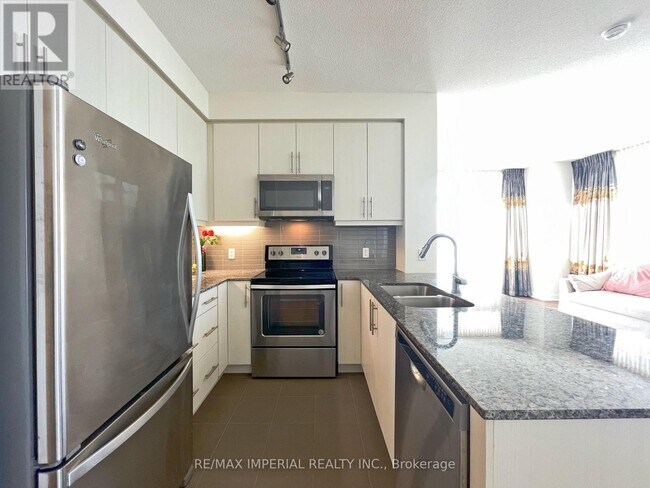 Building Photo - 3975-3975 Grand Park Dr