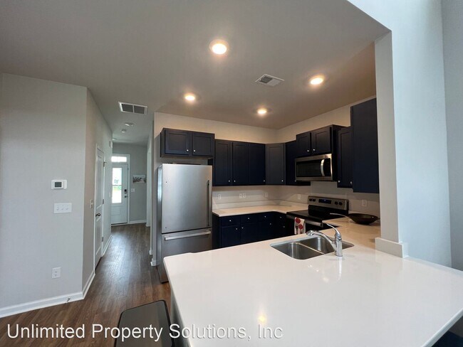 Building Photo - 3 br, 2.5 bath House - 4628 Wildaire Lane