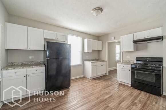 Building Photo - AVAILABLE NOW! - 1111 N 22nd AVE Unit 2, M...