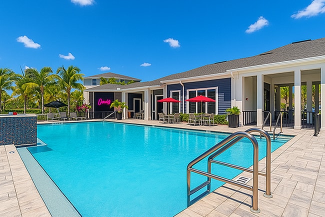 Residents love the pool, spa, grilling station and clubhouse at 81 West Apartments near Daniels Parkway - 81 West Residents love the pool, spa, grilling station and clubhouse at 81 West Apartments near Daniels Parkway - 81 West