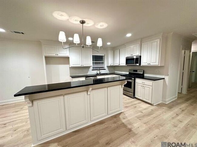 Foto del edificio - 415 Magnolia Wood Ave