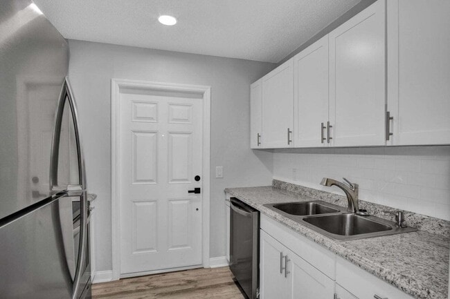 Building Photo - 3166 Melaleuca Dr