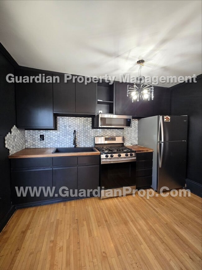 Building Photo - 2621-2623 Colfax Avenue S