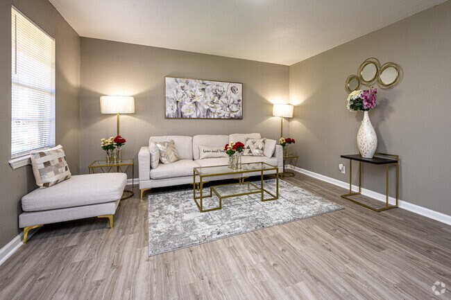 2 habitaciones, 1 baño - 865 pies cuadrados - Sala de estar - Bayou Apartments