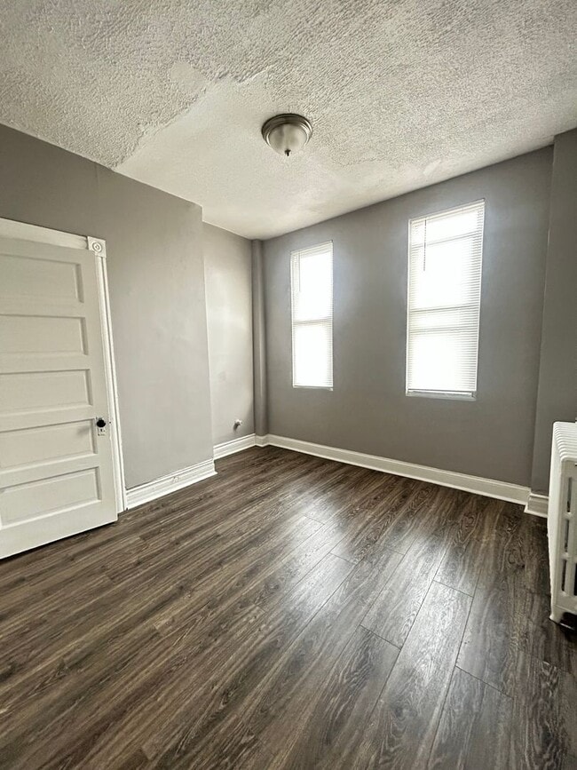 Foto del edificio - Charming Druid Hill Townhouse Available Now