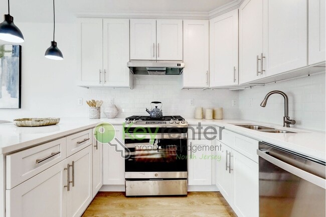 Building Photo - Modern New Construction 3 Bedroom Townhome with Garage & Driveway — First Occupancy!