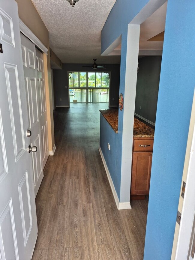 Building Photo - Waterfront Community Living | Updated 2BR/2BA Condo with Private Beach Access