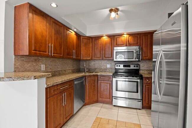 Building Photo - 3750 Village Dr