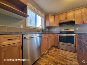 Building Photo - 12212-12218 18 Ave SW