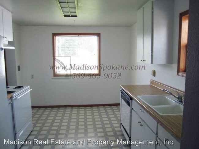 Building Photo - 4 br, 2 bath House - 6523 E. 9th Ave.