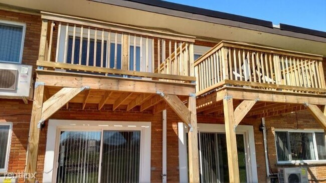 Building Photo - 1 br, 1 bath Condo - 4420 SPRINGER AVE