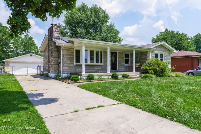 Building Photo - 8003 Canna Dr