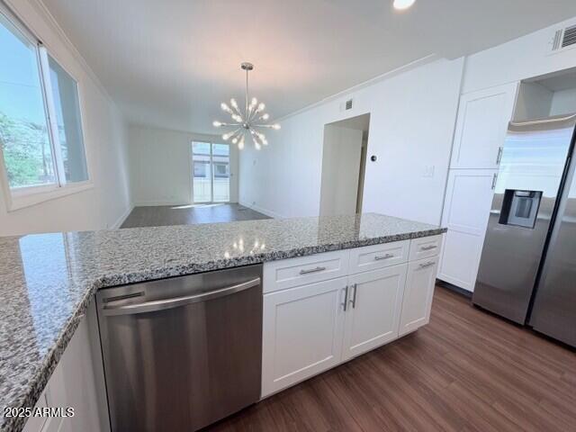 Foto del edificio - 6936 E 3rd St