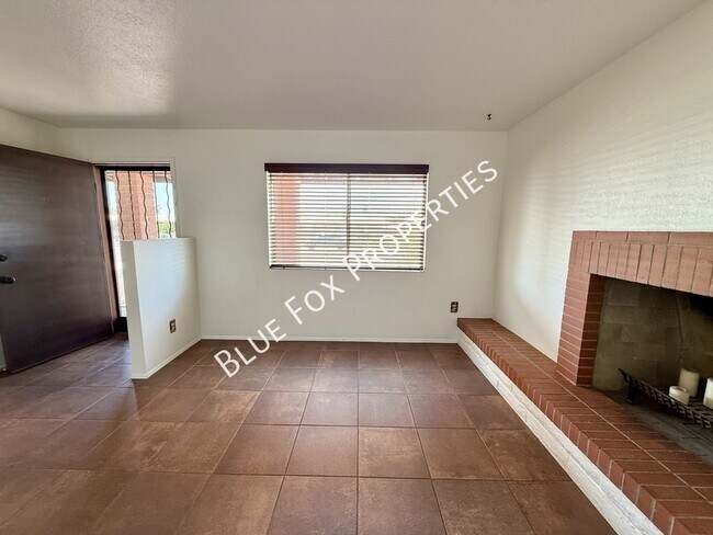 Building Photo - 7650 N Rasmussen Ave