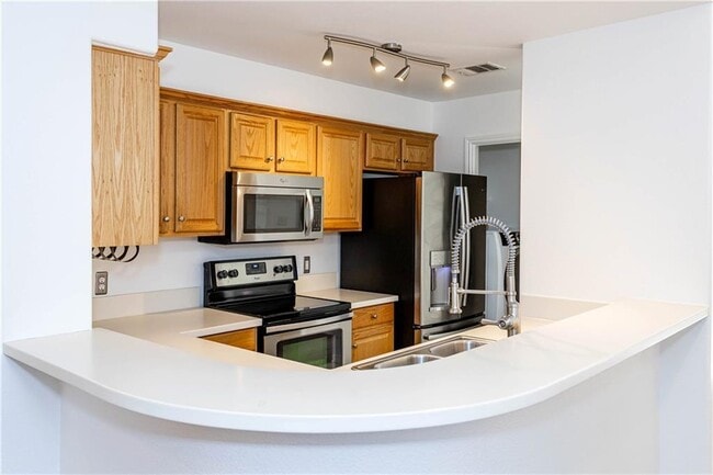 Foto del edificio - 6900 E Riverside Dr