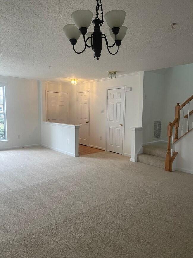 Building Photo - Brick front townhouse with all fresh inter...