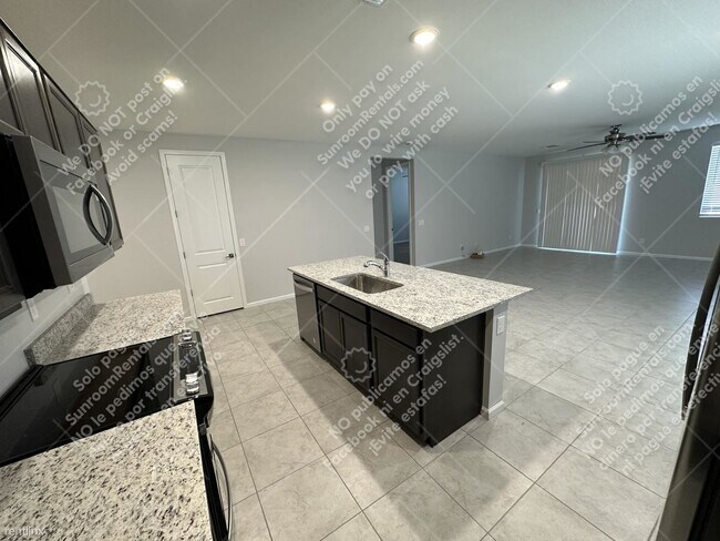 Foto del edificio - 4 br, 3 bath House - 24548 W Durango St