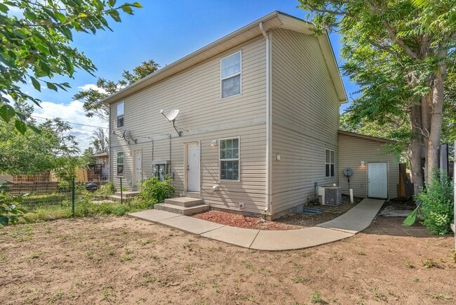 Photo - 6240 E 64th Pl Townhome