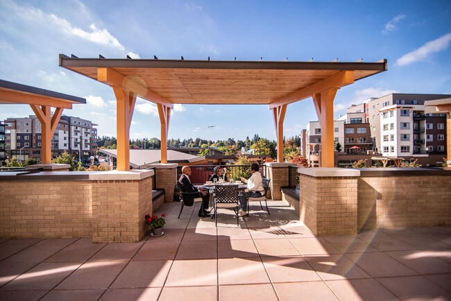 Tukwila Village Courtyard Lunch - Tukwila Village Senior Living Apartments