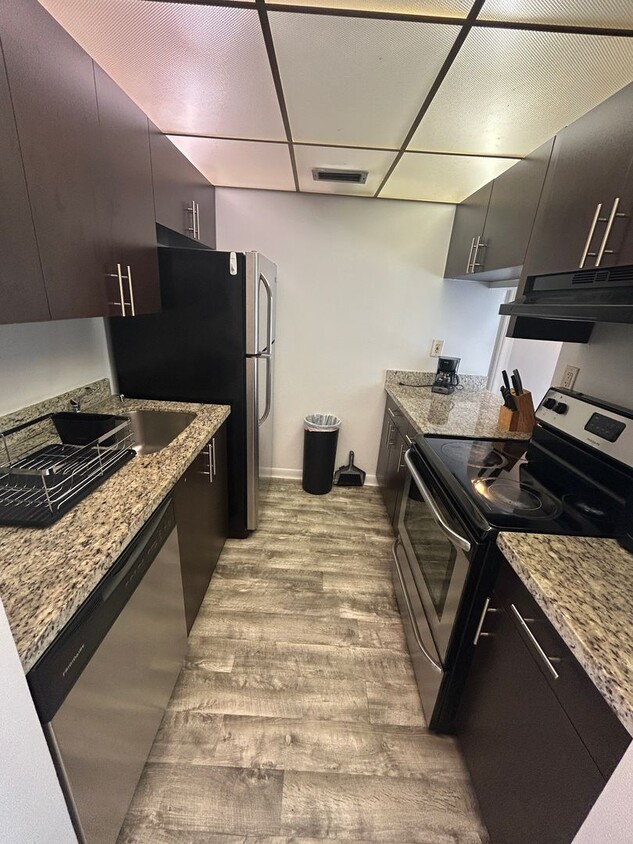 Primary Photo - Now Leasing: 1-bedroom and 1.5 bath condo ...