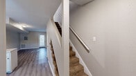 This two-story home in Little Rock, Arkansas offers a practical and well-organized layout spread across two floors. The main level features a combined living and dining area with durable wood-look flooring that extends throughout, a welcoming entrance, and a functional kitchen equipped with white cabinetry, light countertops, a black electric range, dishwasher, and a stainless steel sink. The open kitchen design includes a peninsula that connects to the main living area, making the space feel cohesive and efficient. A carpeted staircase with a white handrail leads to the upper level, where both bedrooms are located. Each bedroom features wood-look flooring, neutral-toned walls, and windows that bring in natural light. The upper floor also includes a hallway, multiple closets for ample storage, and a full bathroom with a tiled tub-shower combination. Throughout the home, a consistent neutral color palette of warm beige and white tones creates a clean, move-in-ready atmosphere. The layout is thoughtfully arranged to maximize functionality, making this home a solid option for those seeking a straightforward and efficient living space in Little Rock.