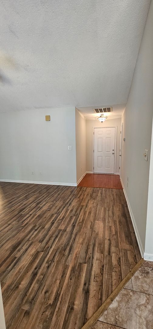 Building Photo - “Plantation Pines Living: Where Every Day ...