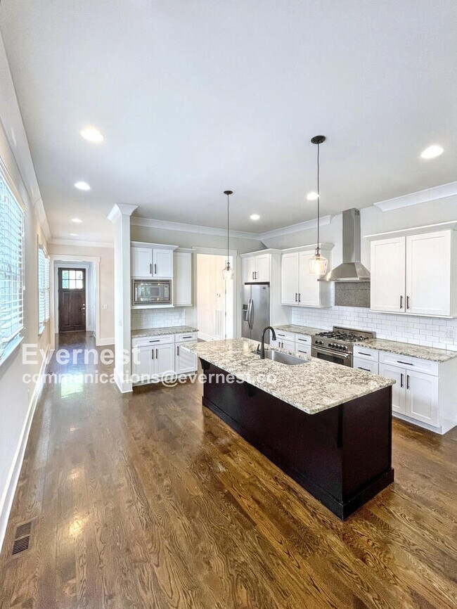 Building Photo - Spacious 4-Bedroom Retreat with Fenced Yar...