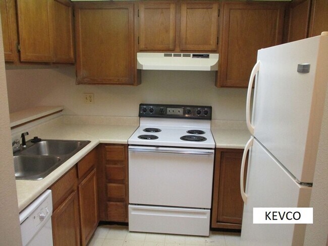 Building Photo - $1400 Price INCLUDES: water, sewer, and trash.