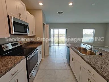 Foto del edificio - 7412 French Marigold Ave.