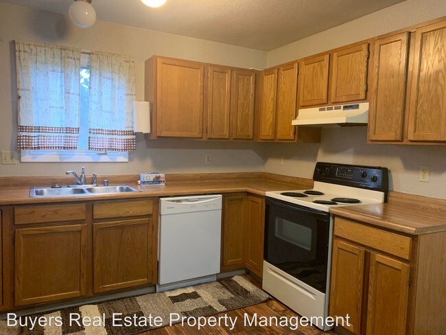 Building Photo - 3 br, 1.5 bath House - 3831 E 66th Avenue