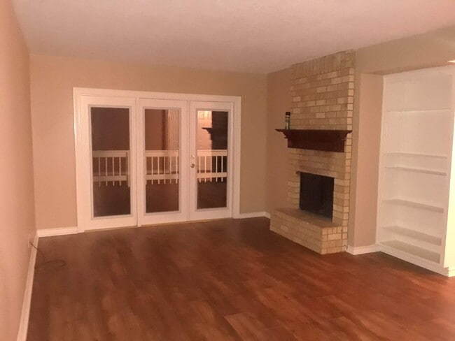 Living room with a lake view. - 230 Waters Edge