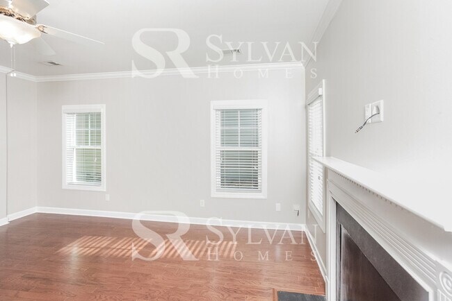 Building Photo - The living is easy in this lovely 5 bedroo...