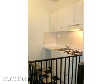 Building Photo - 4 br, 2 bath Apartment - 140 E 7th St
