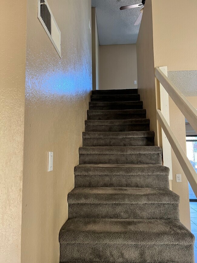 Stairs to the bedroom loft - 195 Bel Port Dr