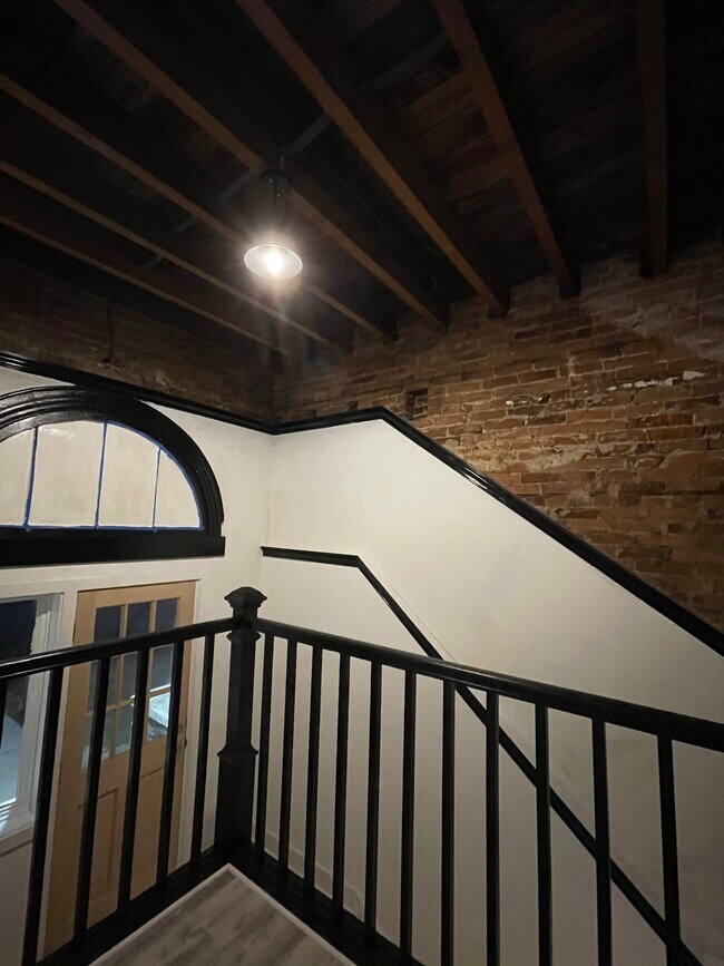 Exposed brick and wood - 126 Norwood St