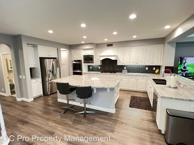 Building Photo - 4 br, 3.5 bath House - 7878 E Portico Terrace