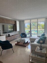 Building Photo - 19380 Collins Ave